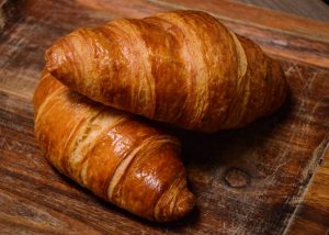 Selection of freshly baked breads with savory butter